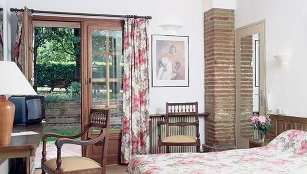 Le Ratelier Hotel Montaigut-sur-Save Room photo